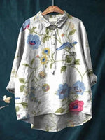 Blus med blommönster