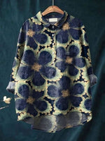 Blus med blommönster