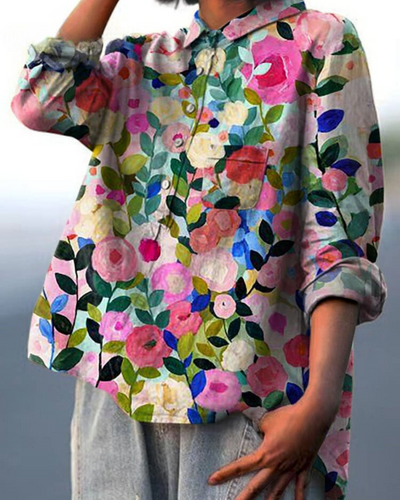 Blus med blommönster