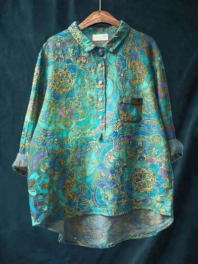 Blus med blommönster