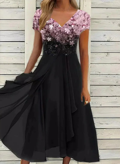 Yvonne klänning med blommönster