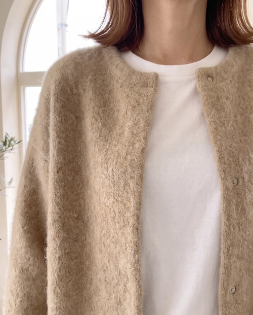 Wren stickad kofta – oversized med tryckknappar – beige