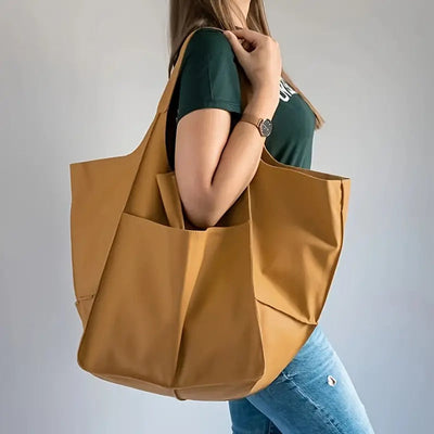 Charlotte shoppingväska i konstläder