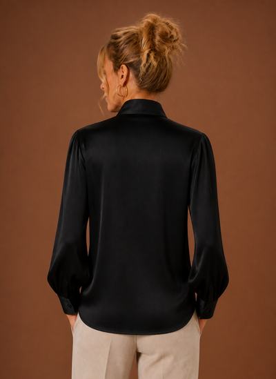 Blus i satinlook med rosett