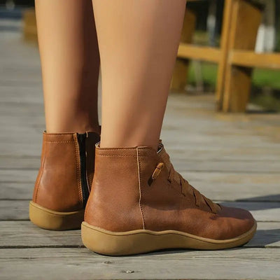 Clara boots i konstläder