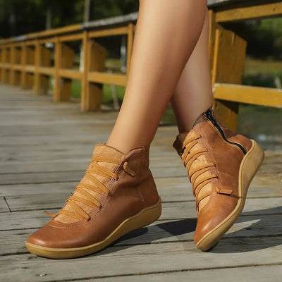 Clara boots i konstläder