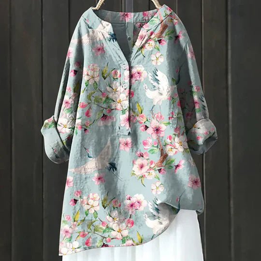 Clara blus med blommönster