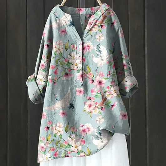 Clara blus med blommönster