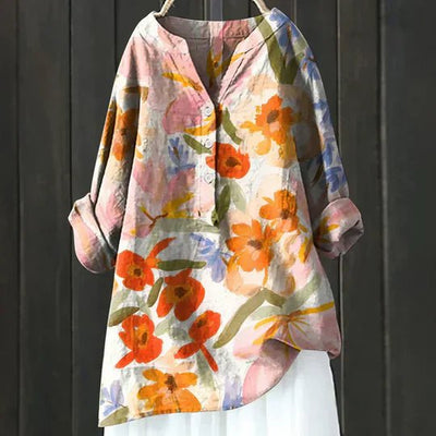 Clara blus med blommönster