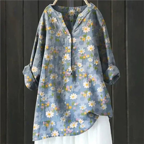 Clara blus med blommönster