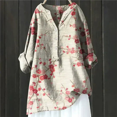 Clara blus med blommönster