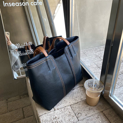 Leonie shoppingväska i konstläder