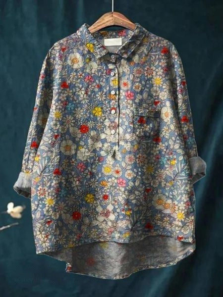 Blus med blommönster