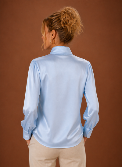 Blus i satinlook med rosett